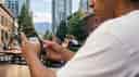 A man on his phone relevant to casino bonuses