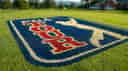 PGA Tour logo on a tee box. 