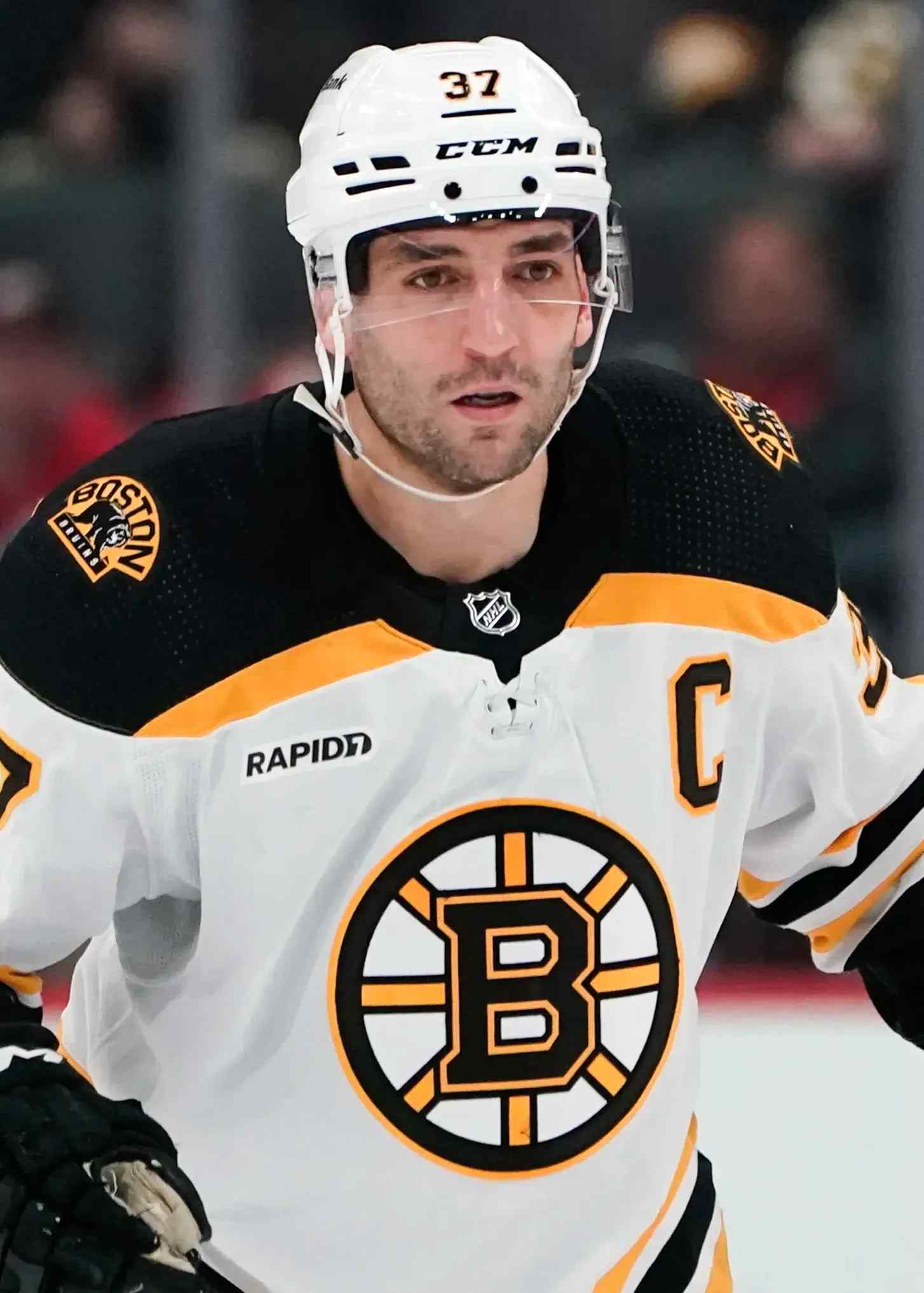 Patrice Bergeron wearing the C for the Boston Bruins.