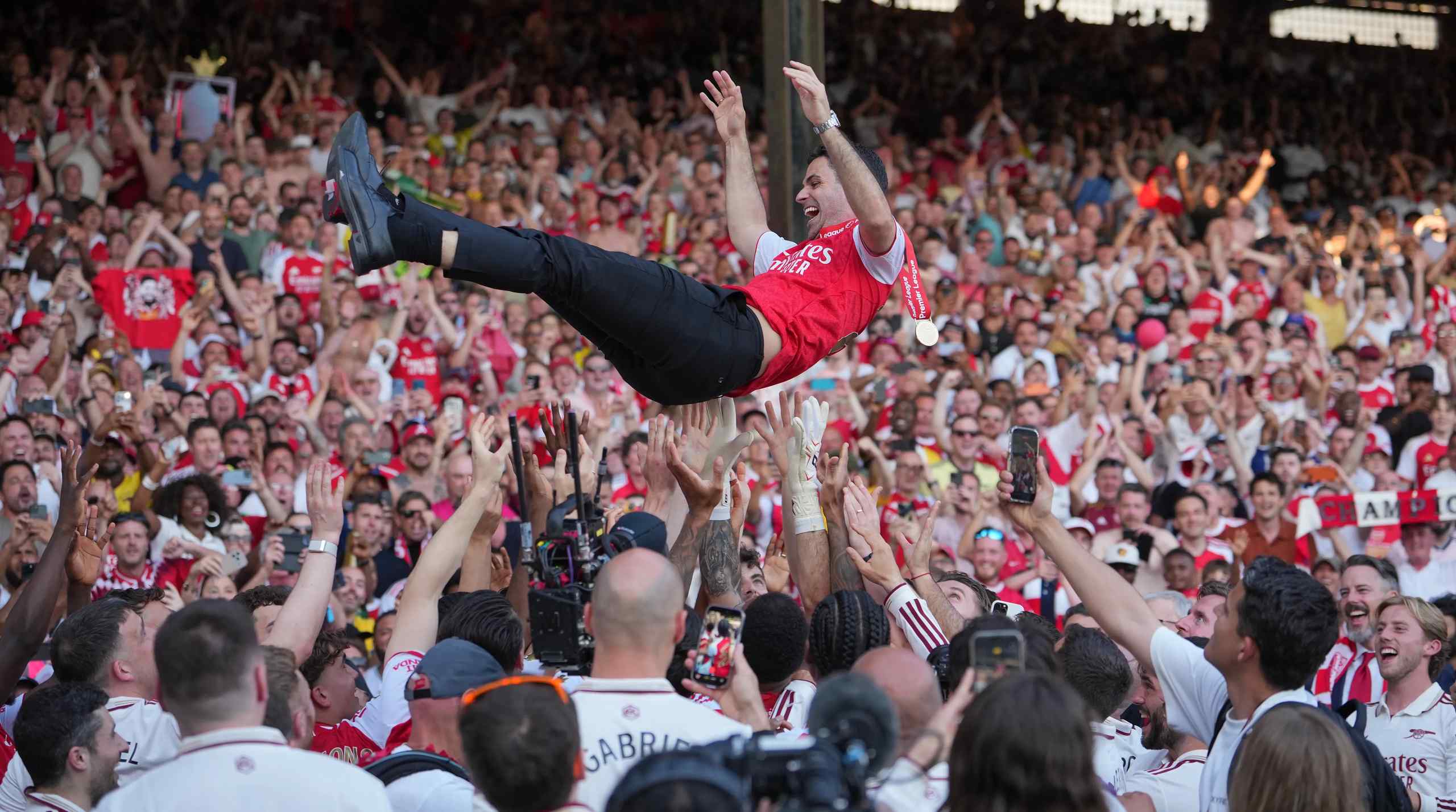premier league fan crowd surfing