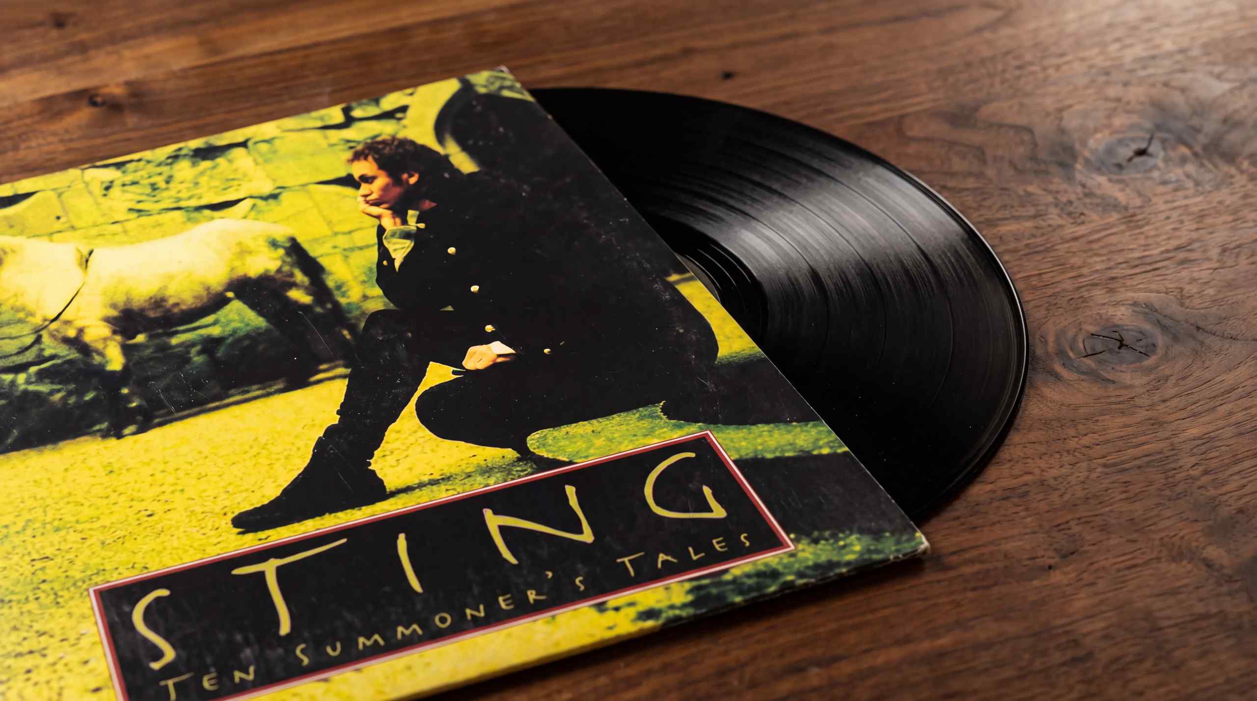 Sting vinyl album sitting on a table.