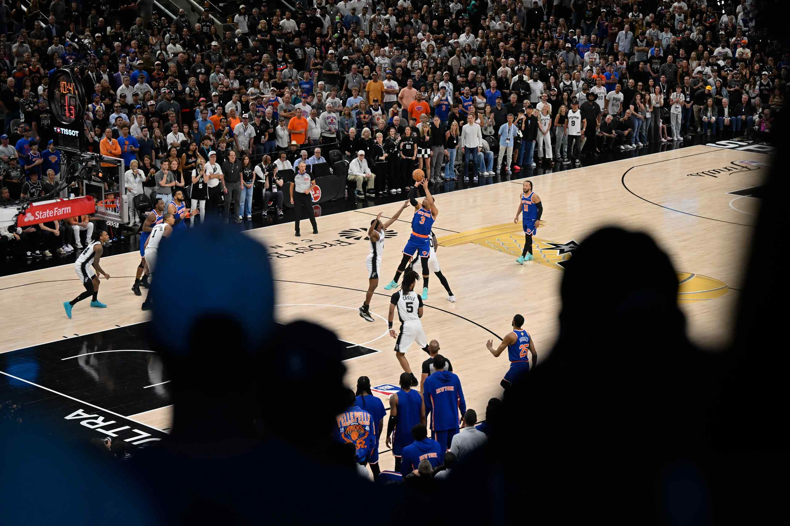 Spectators taking in an NBA game.