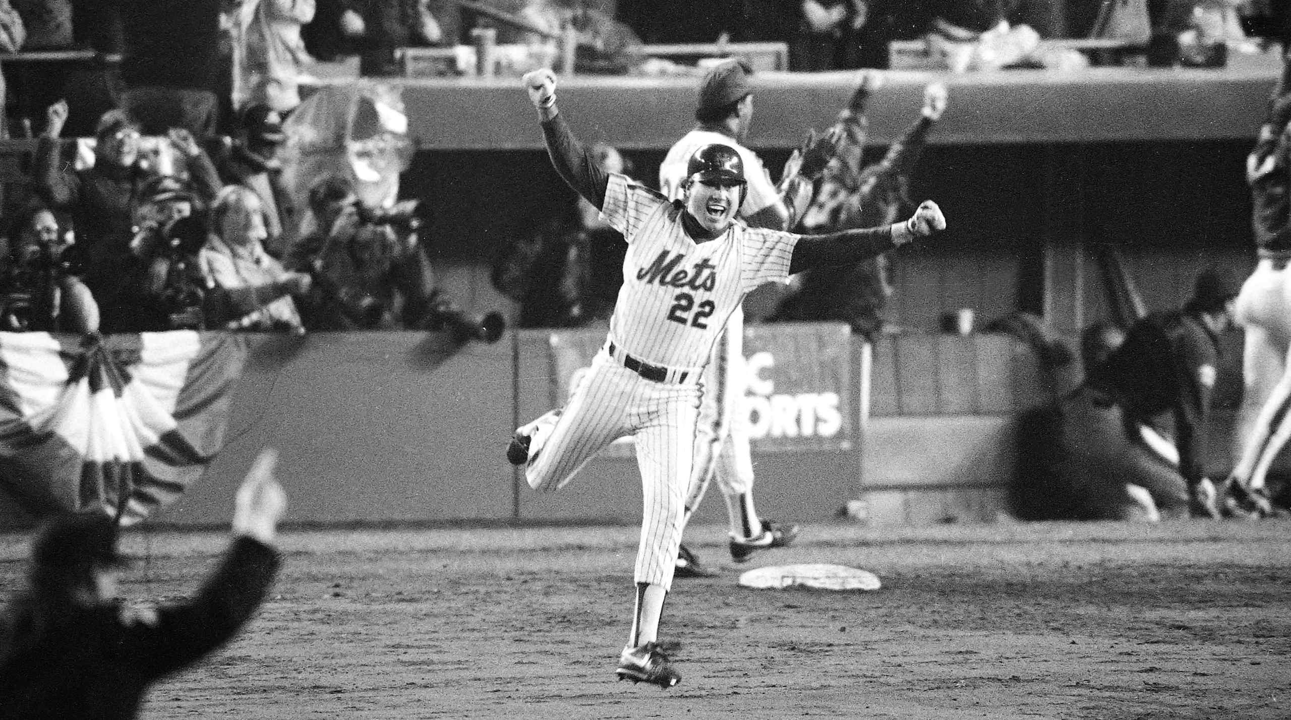 New York Mets third baseman Ray Knight celebrating his go-ahead, seventh-inning home run during Game 7 of the 1986 World Series