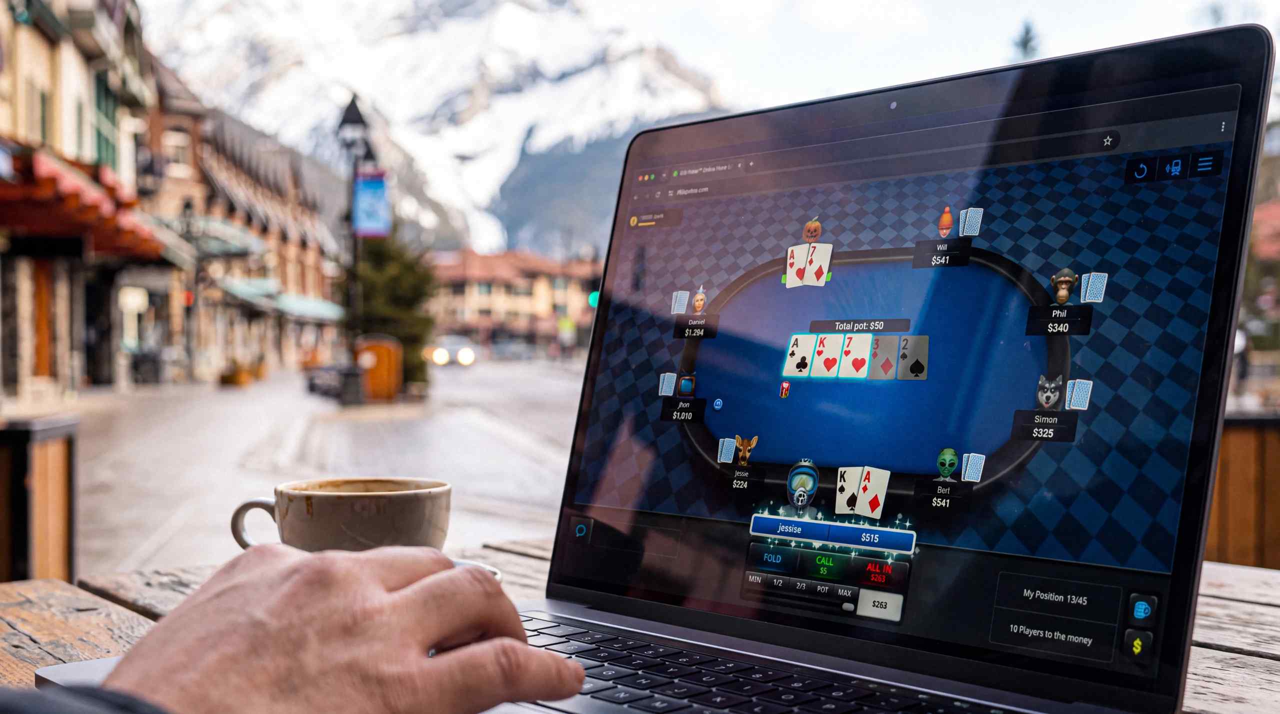 Someone enjoying online poker with the Canadian rockies in the background.