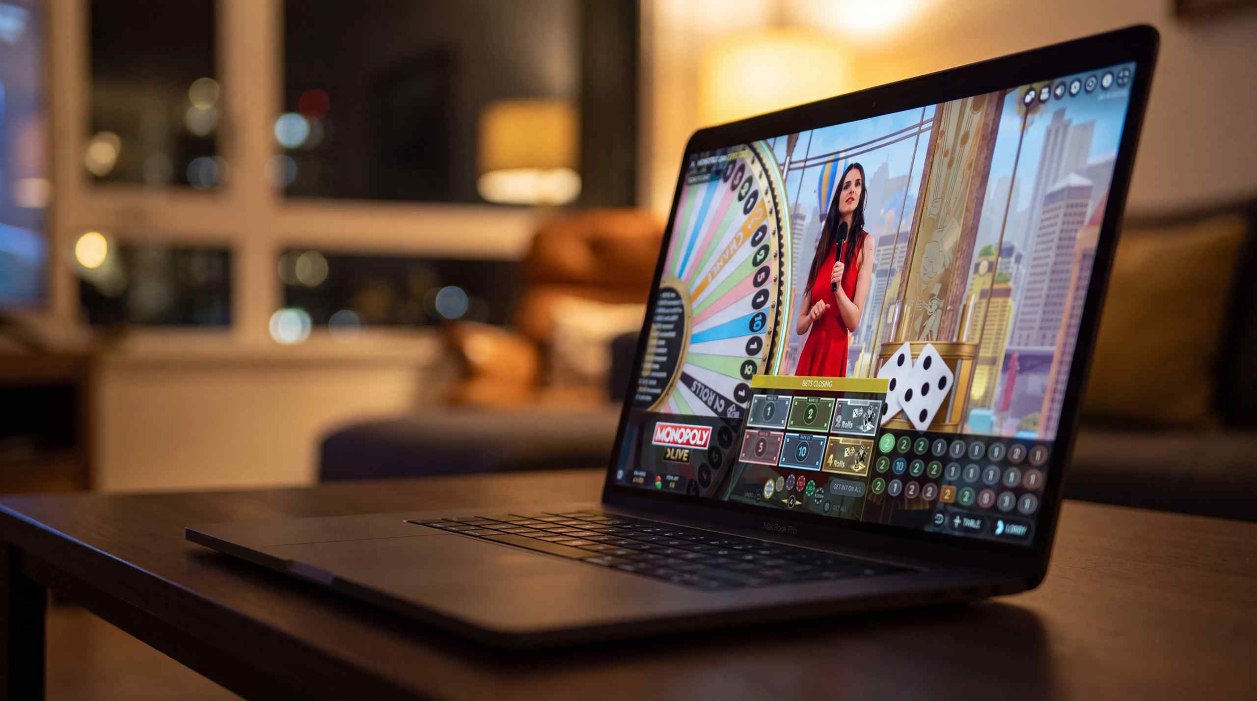 A laptop running a live casino game show.