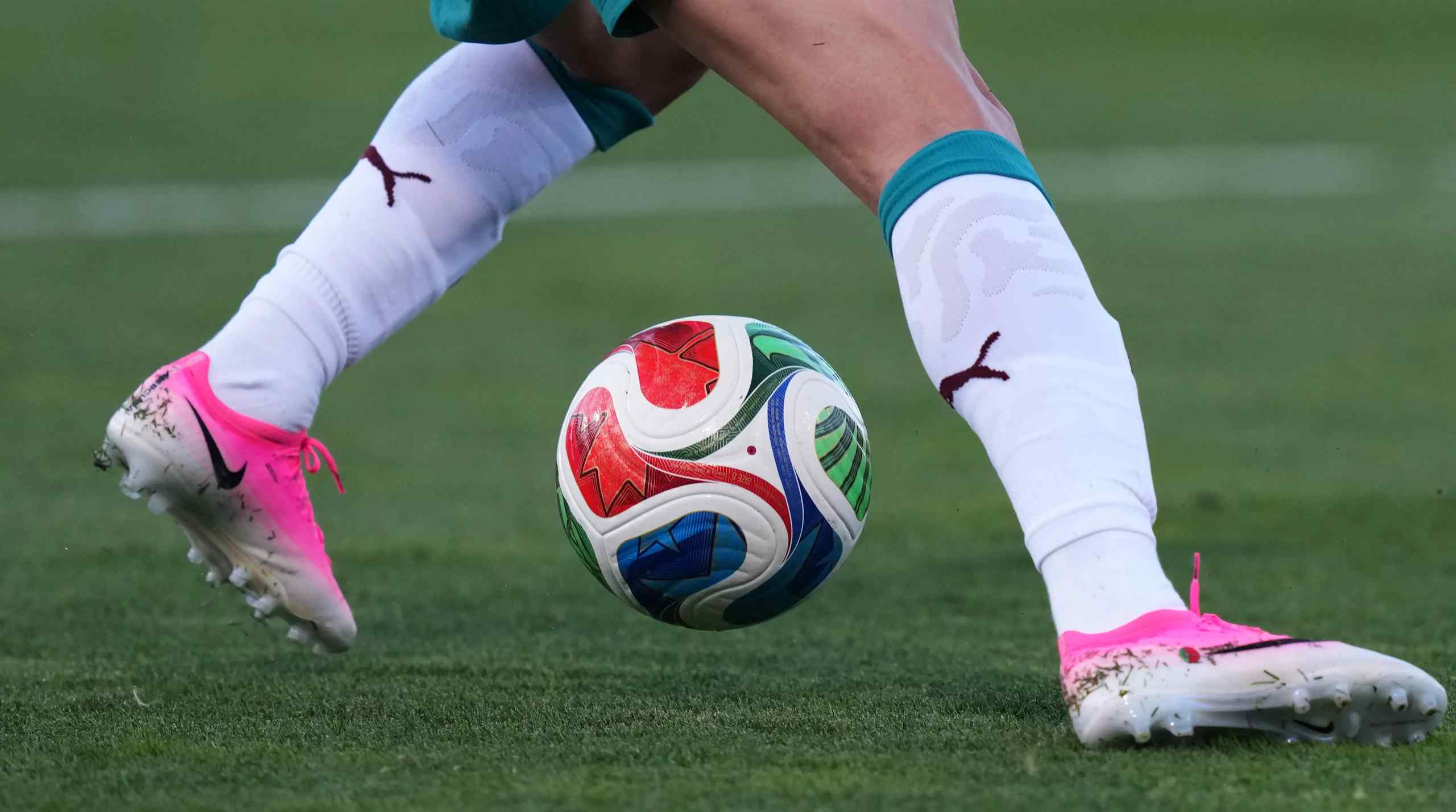 soccer ball being dribbled