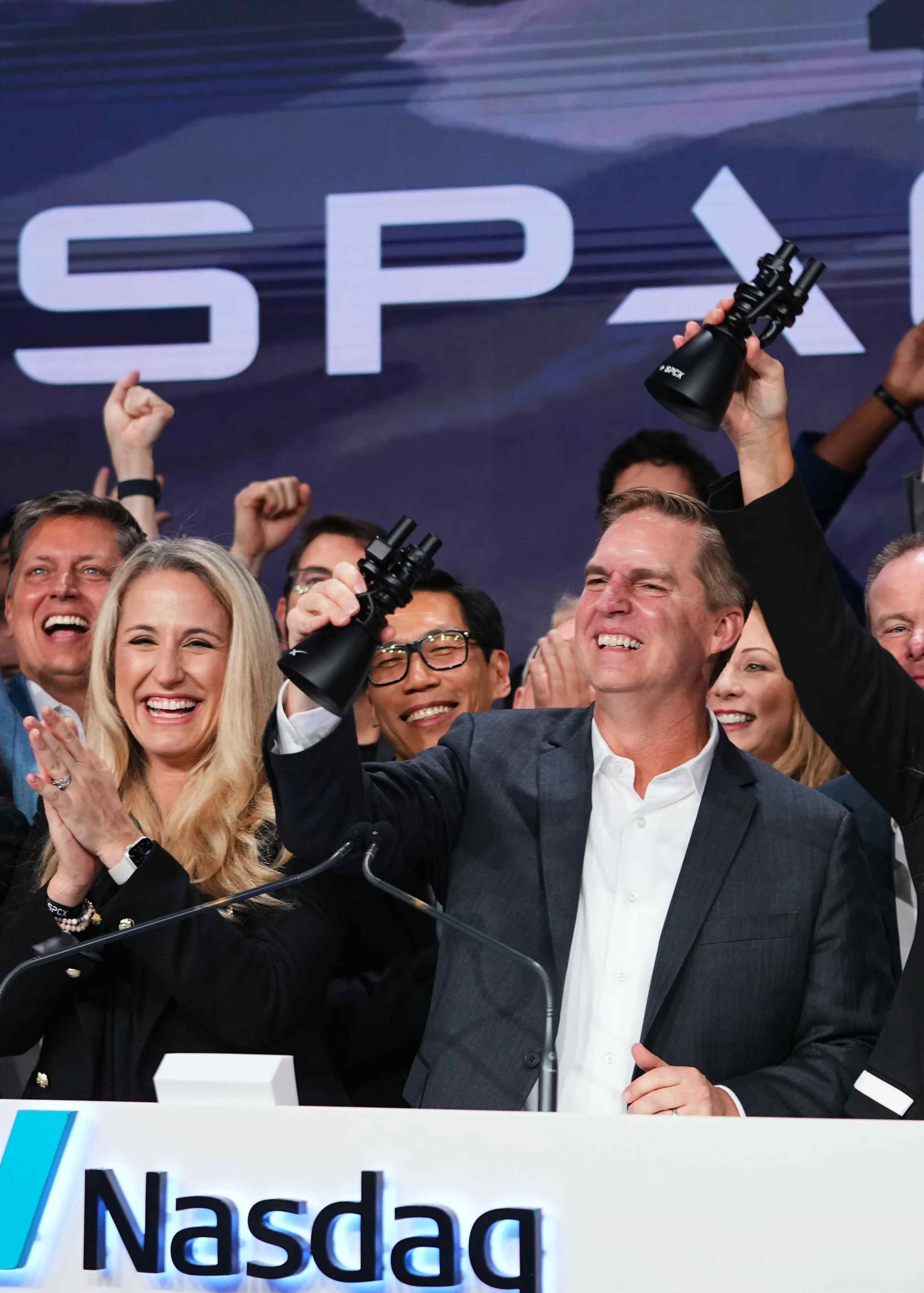 SpaceX President and COO Gwynne Shotwell celebrating during the company's initial public offering (IPO) bell-ringing ceremony at the Nasdaq MarketSite in New York.