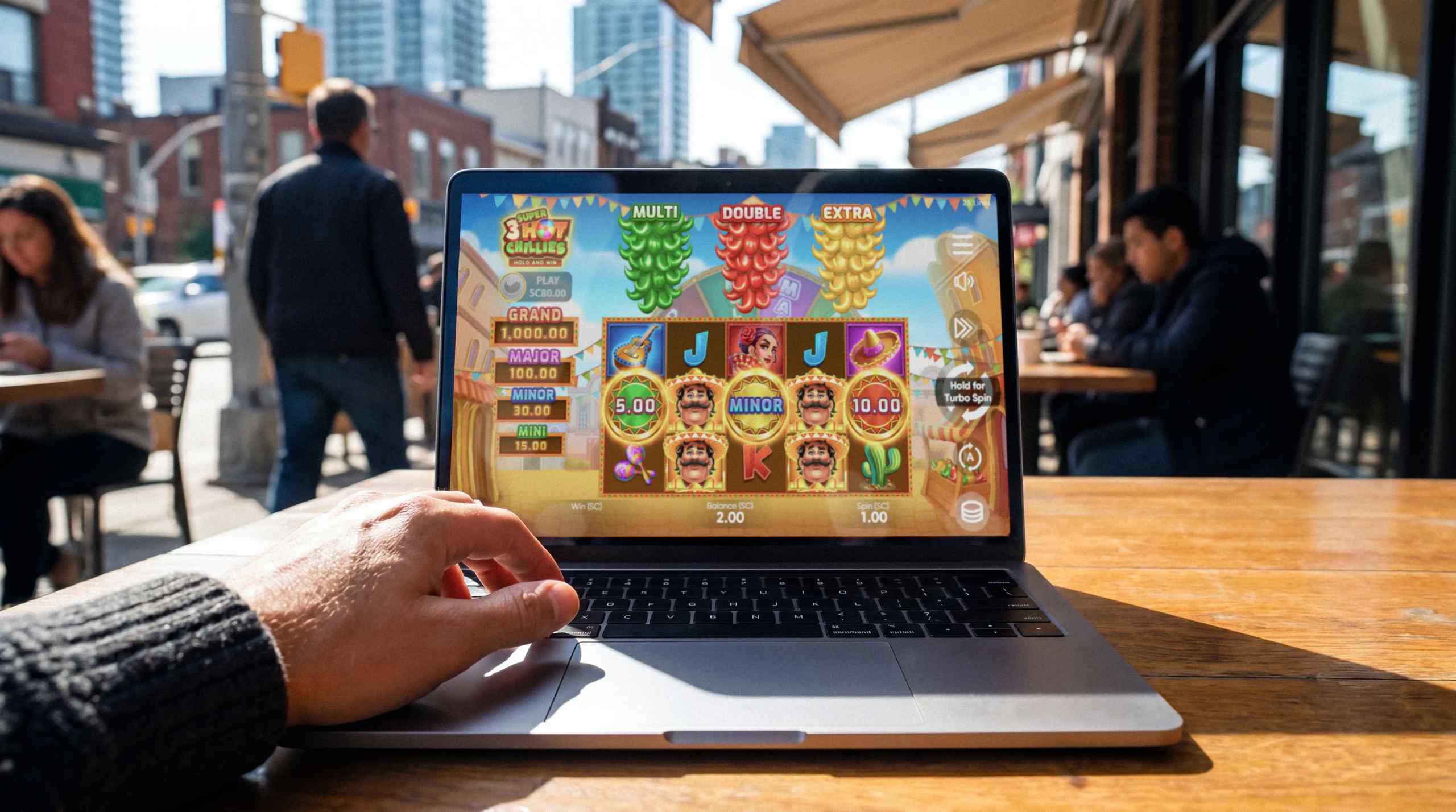 A laptop running a sweepstakes casino with slots running.
