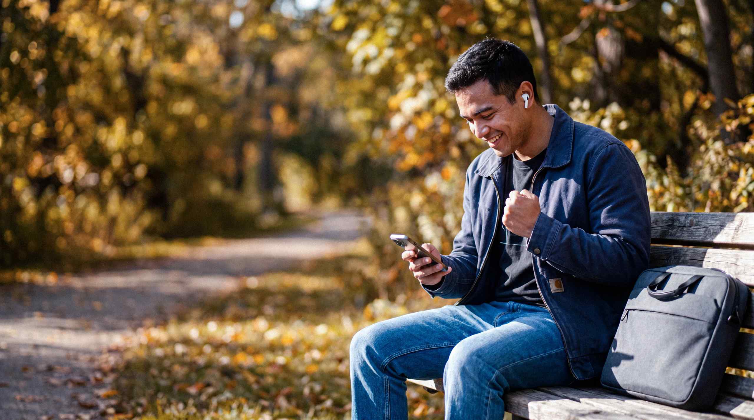 A man playing a game on his phone.