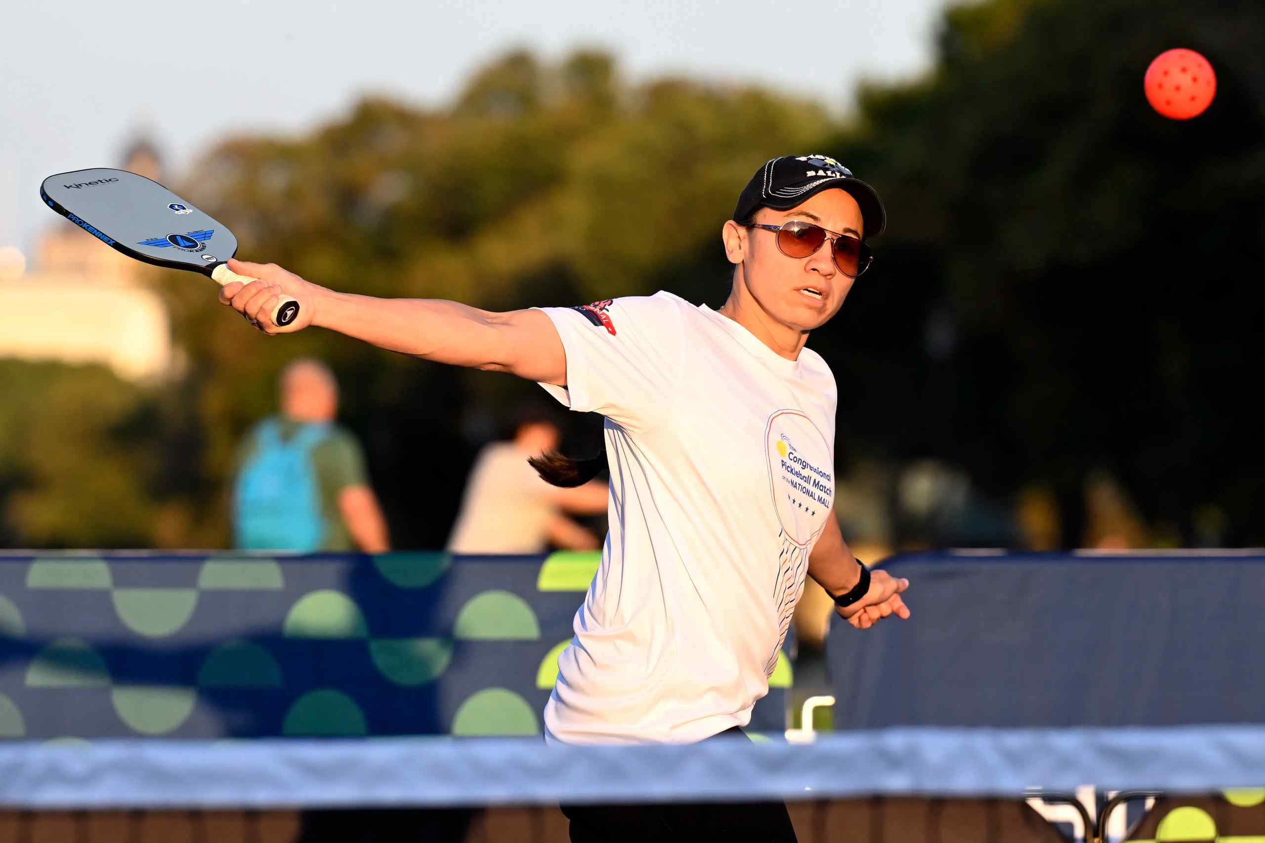 A man playing pickleball