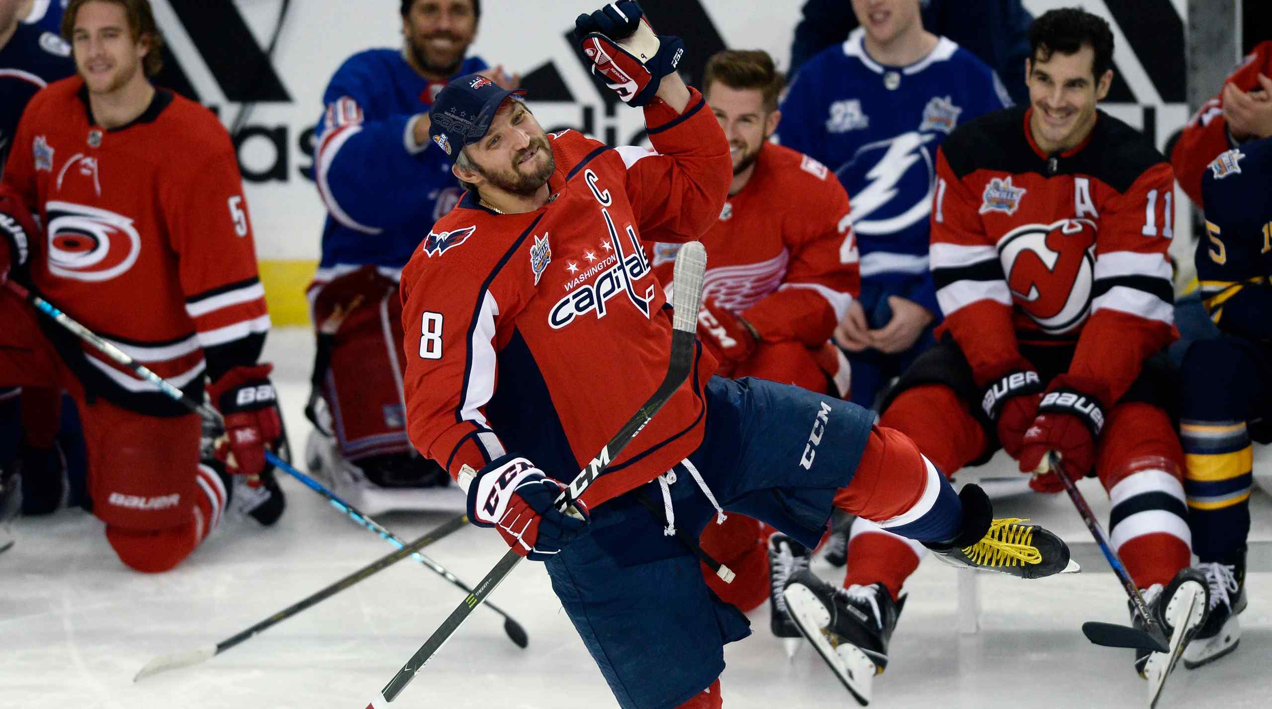 Alexander Ovechkin waves to the crowd.