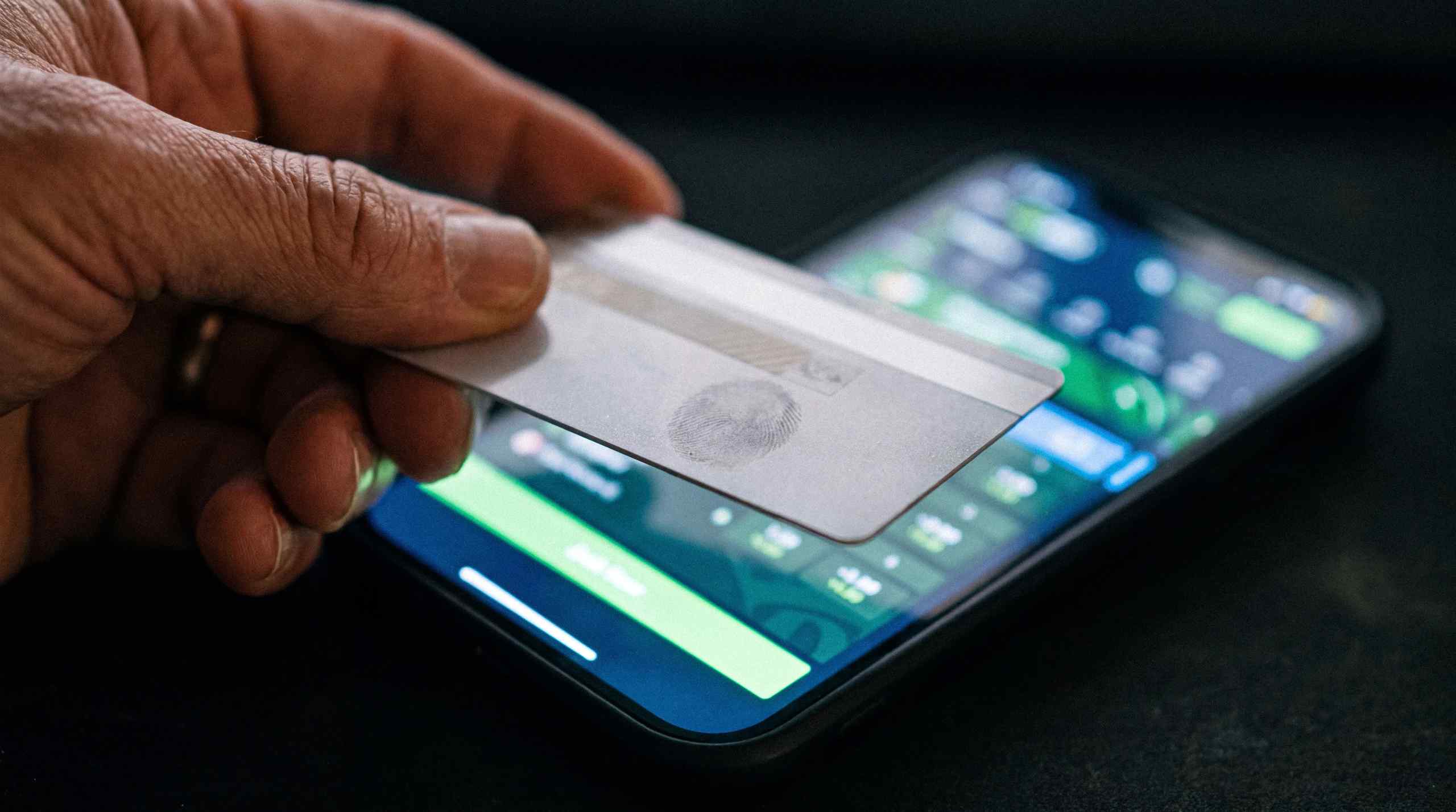 A man making deposit on an online gambling app using a credit card.