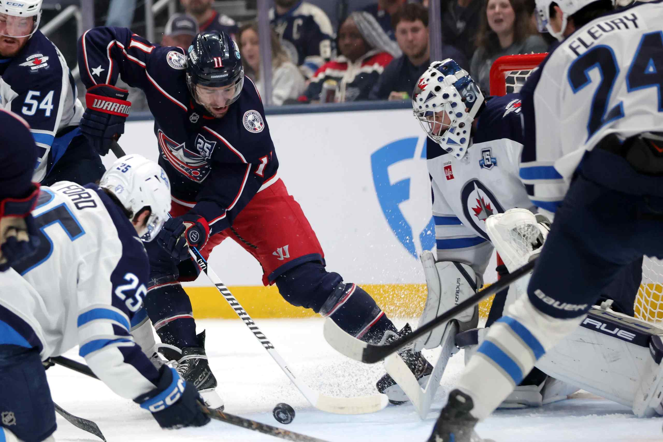 A photo of an NHL match between the Columbus Bluejackets and the Winnipeg Jets.