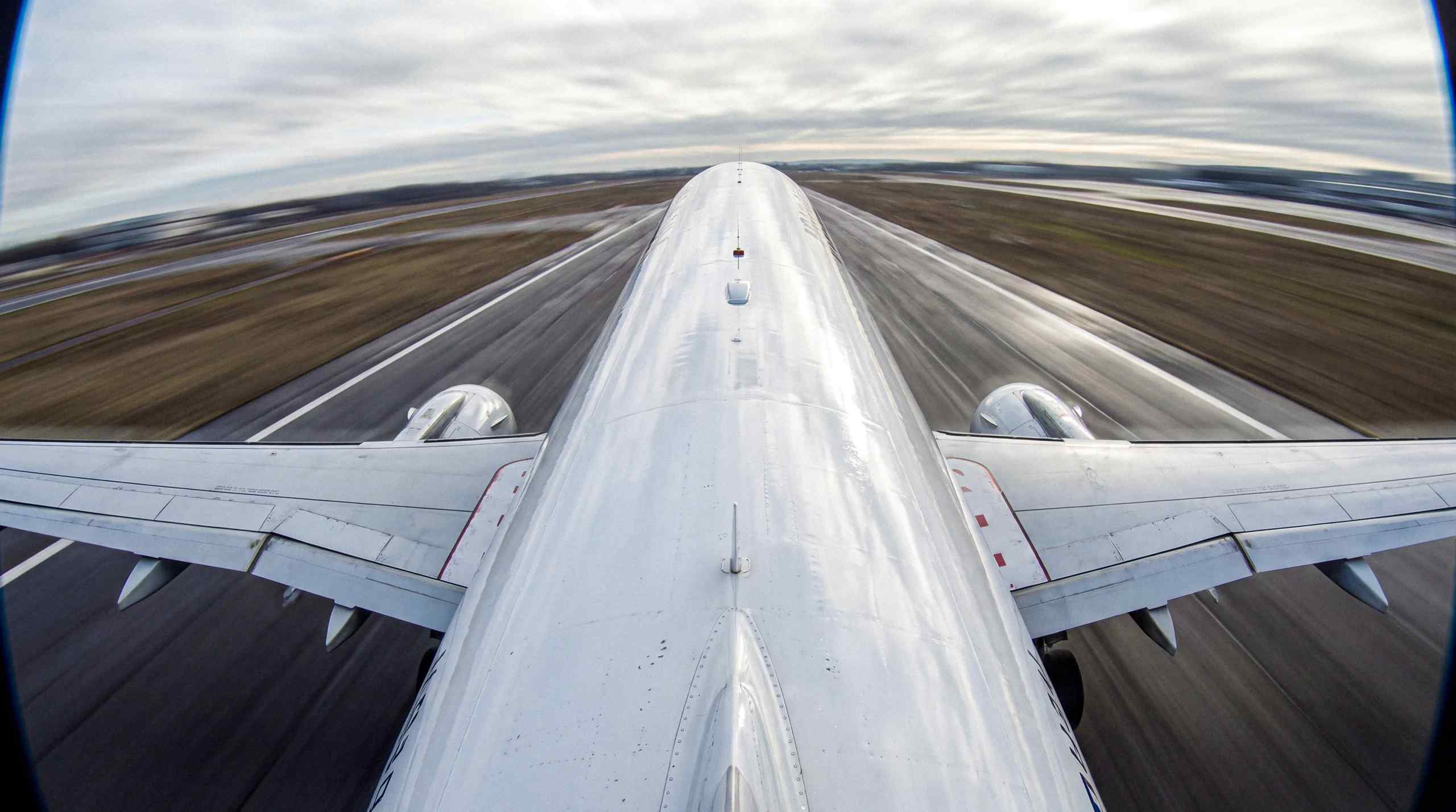 top airplane on runway