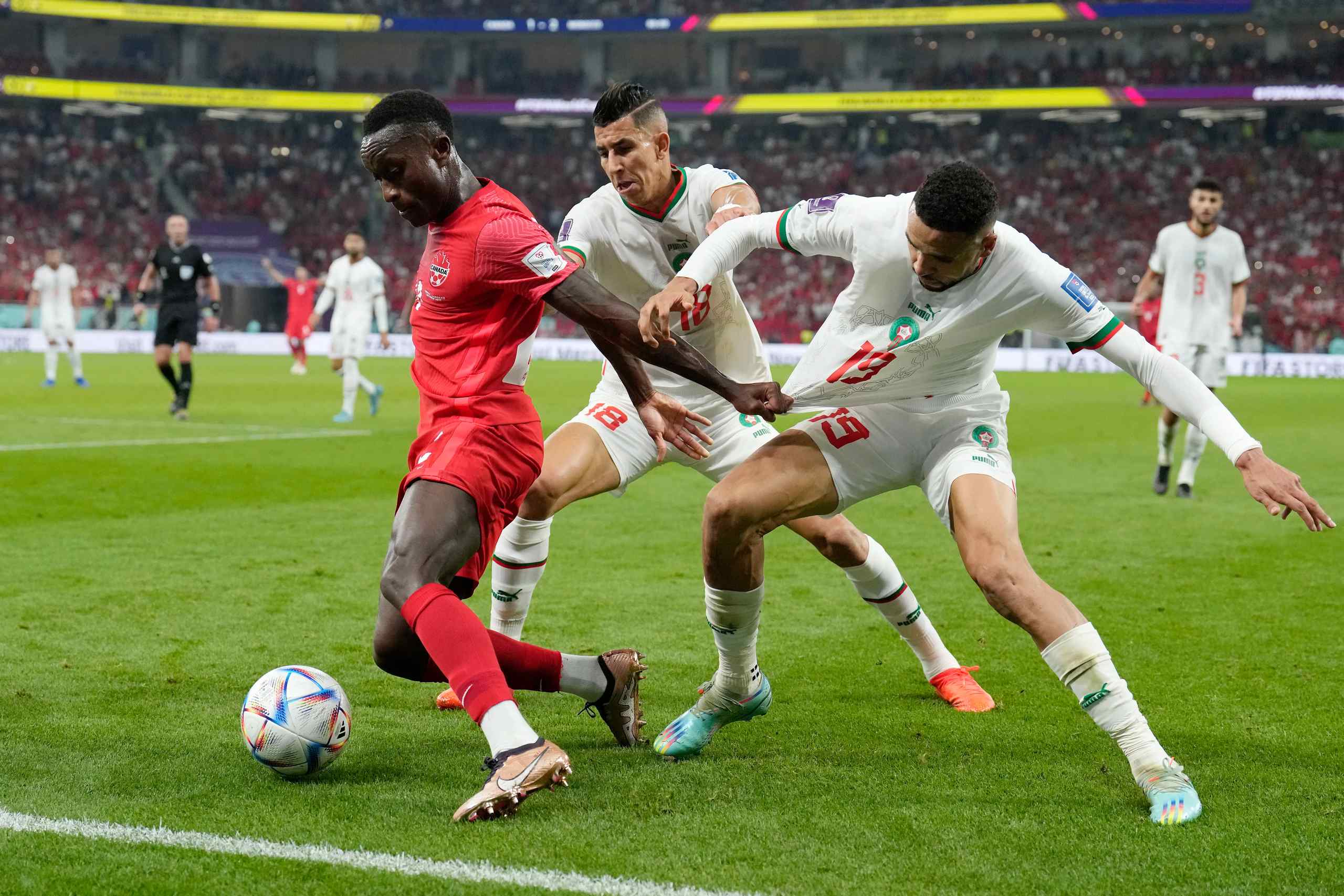 A world cup match between Canada and Morocco